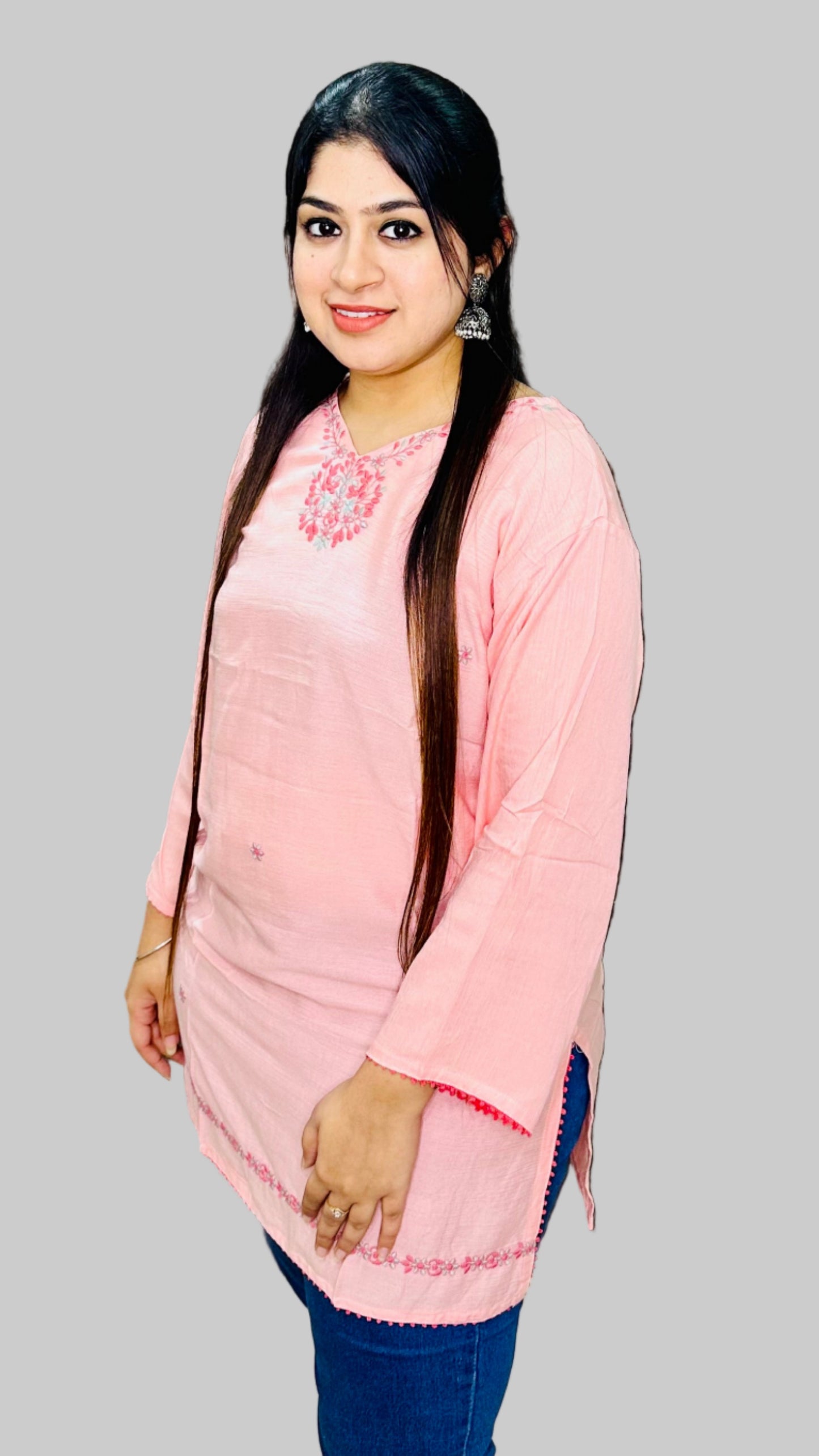 This baby pink kurti is crafted from soft, breathable rinkal reyon fabric, ensuring comfort and durability.
