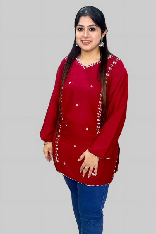 This red kurti crafted from premium Rinkal Rayon fabric offers a perfect blend of comfort and style.