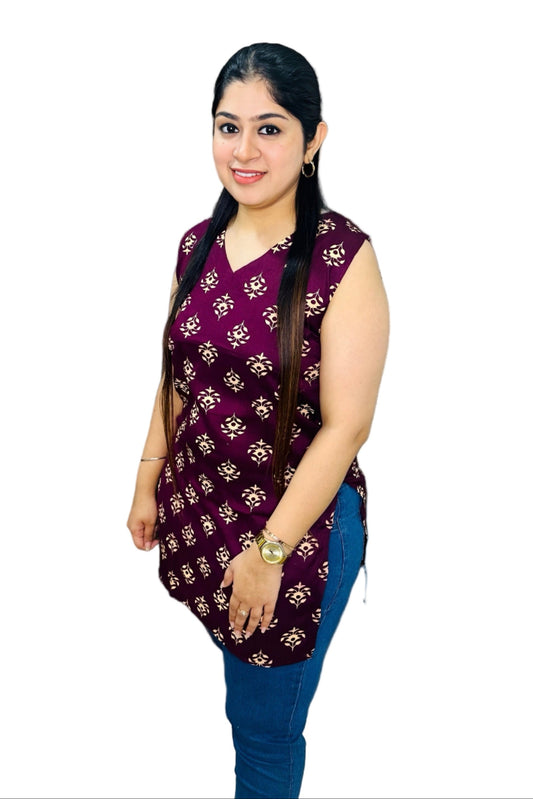 The PurpleHaze Kurti combines breathable cotton fabric with a sleek sleeveless design, making it perfect for both office and casual settings.
