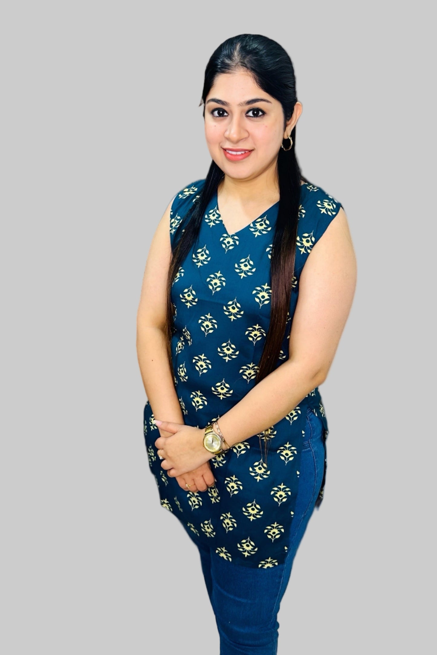 This navy blue sleeveless kurti, crafted from breathable cotton, makes an ideal choice for office wear. 