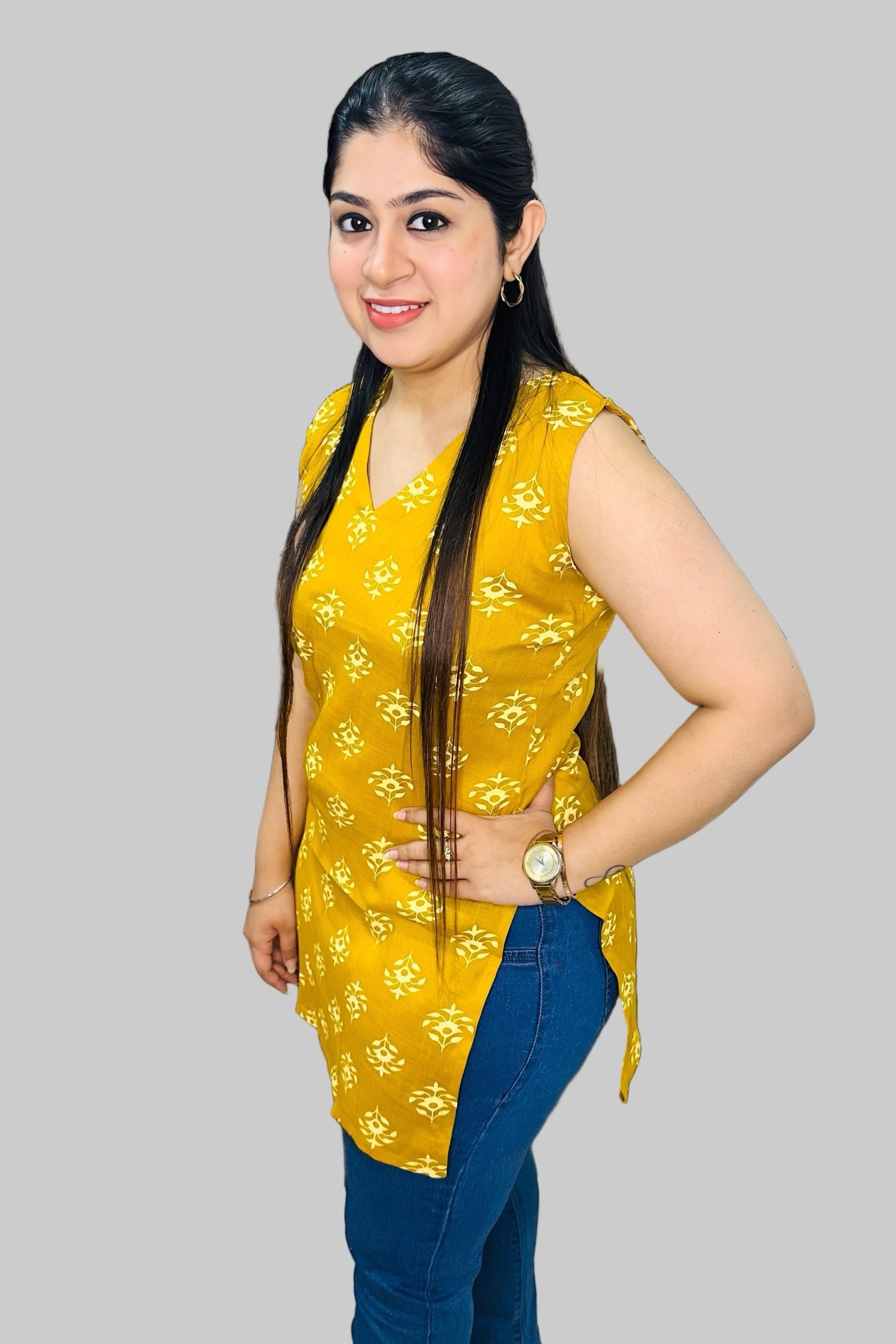 This mustard sleeveless short kurti combines vibrant color with a streamlined silhouette, perfect for every day / office wear. 