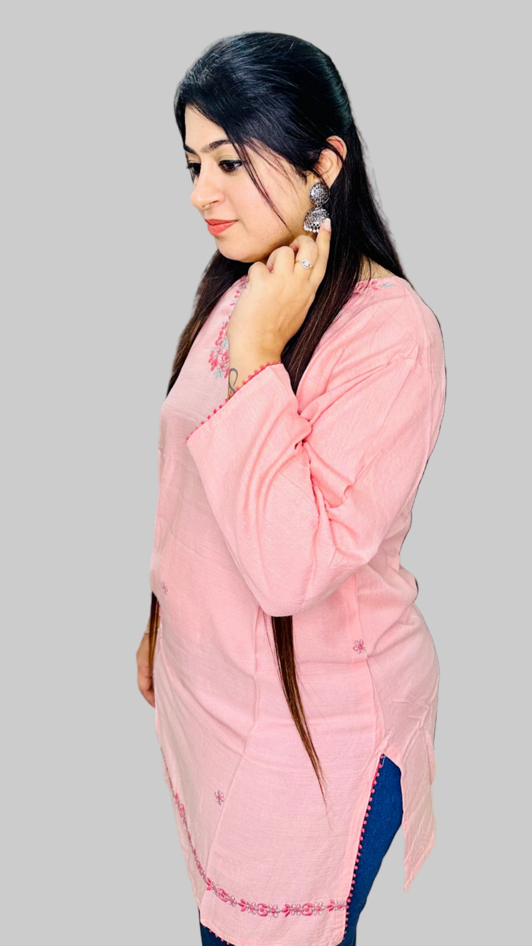 This baby pink kurti is crafted from soft, breathable rinkal reyon fabric, ensuring comfort and durability.