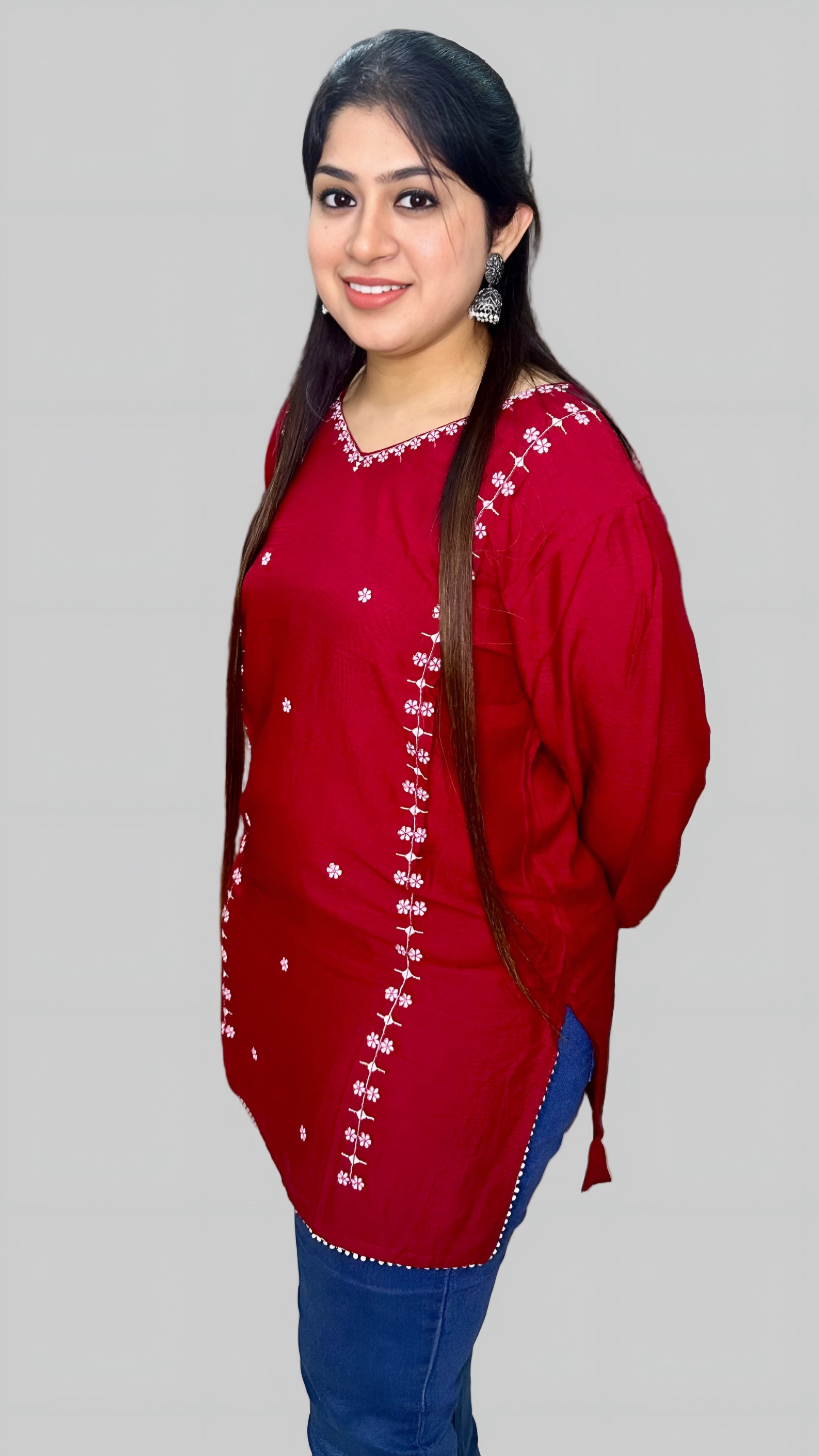 This red kurti crafted from premium Rinkal Rayon fabric offers a perfect blend of comfort and style.